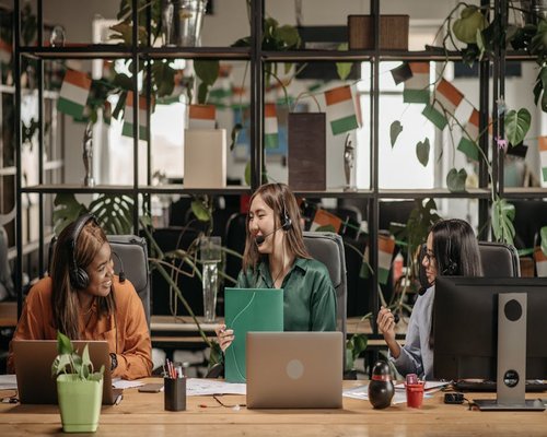 A friendly customer support or office workspace setup in India
